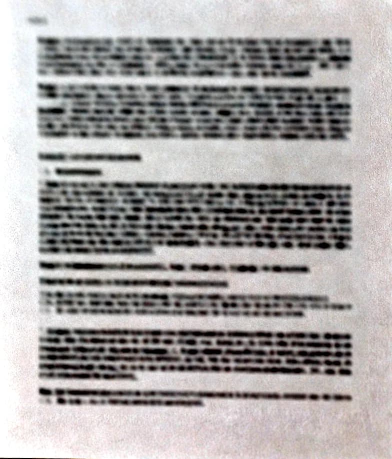 The same document corrected to a flat rectangular scan with neutral white paper