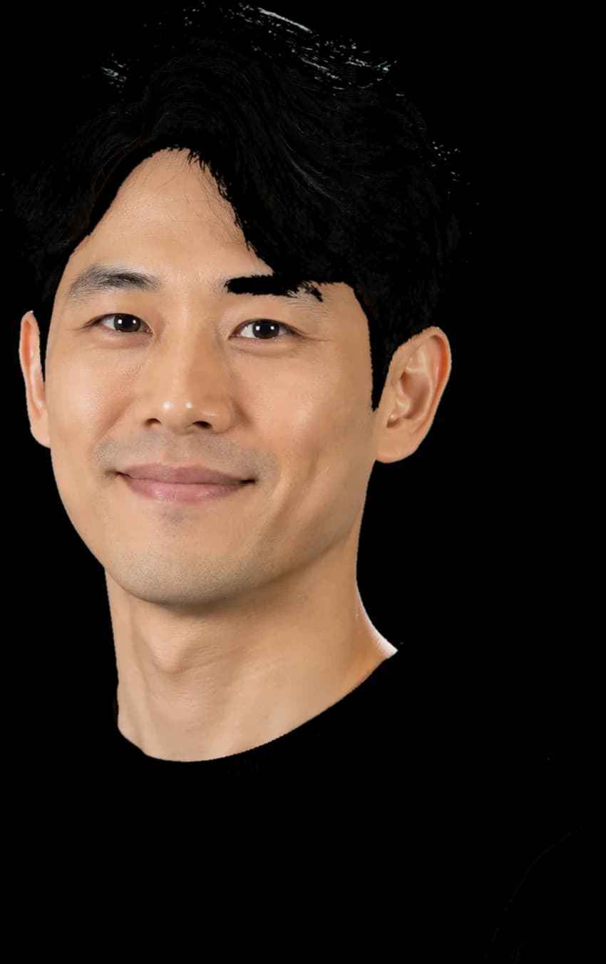 The same headshot cut out to a transparent PNG, with hair edges showing the limits of a manual cut-out