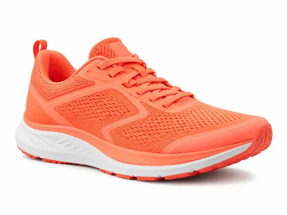 Orange sneaker product photo on a white studio background before background removal